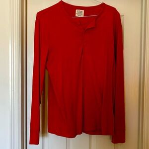 Long sleeve shirt w/ 3 buttons. Great for fall!